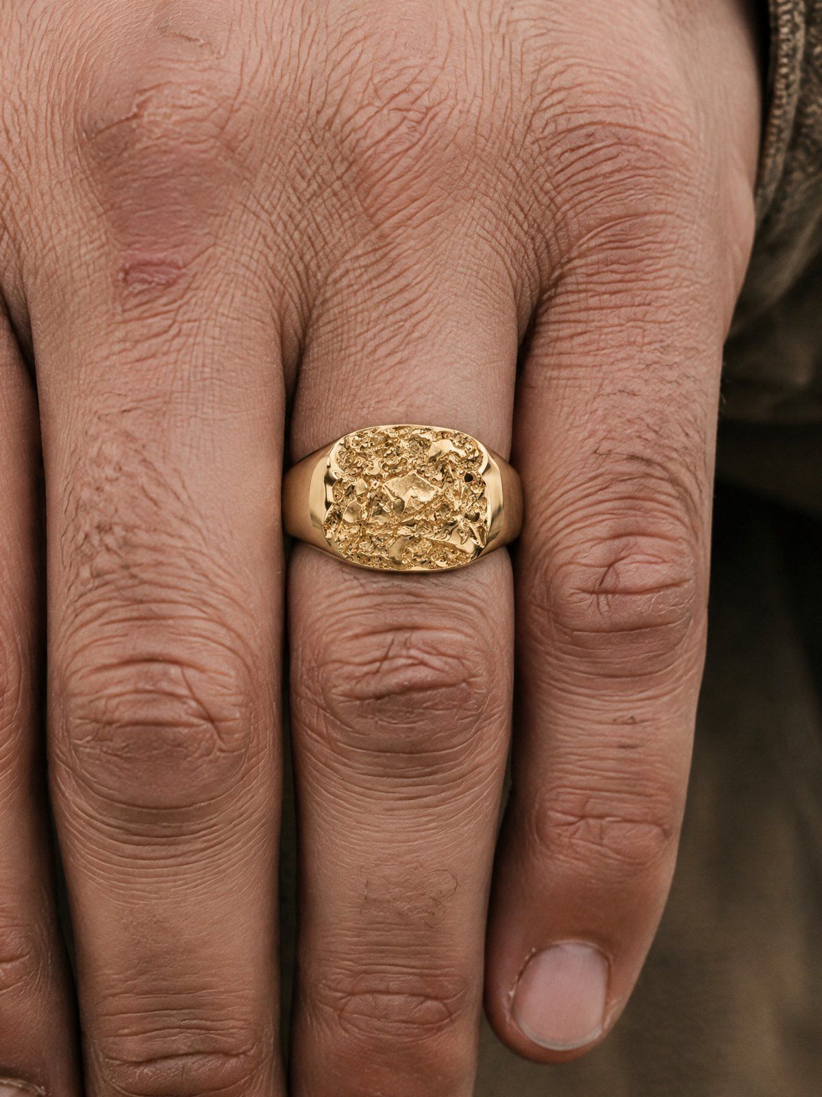 The Block No. 014 in solid 14K gold, worn on the hand