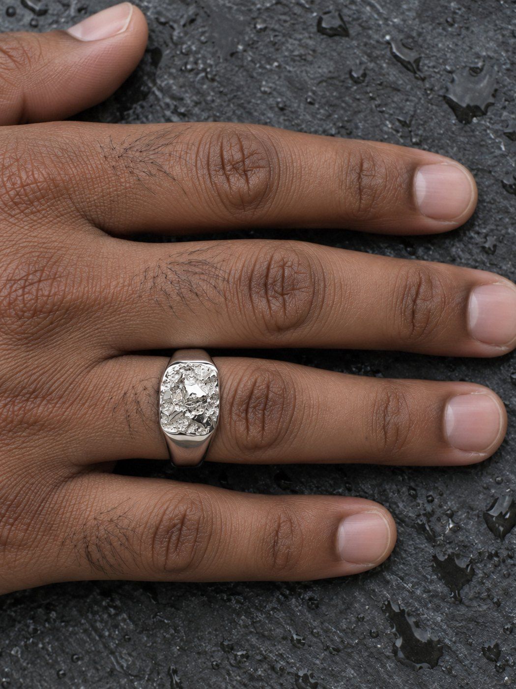 The Block No. 014 in sterling silver, worn on another hand