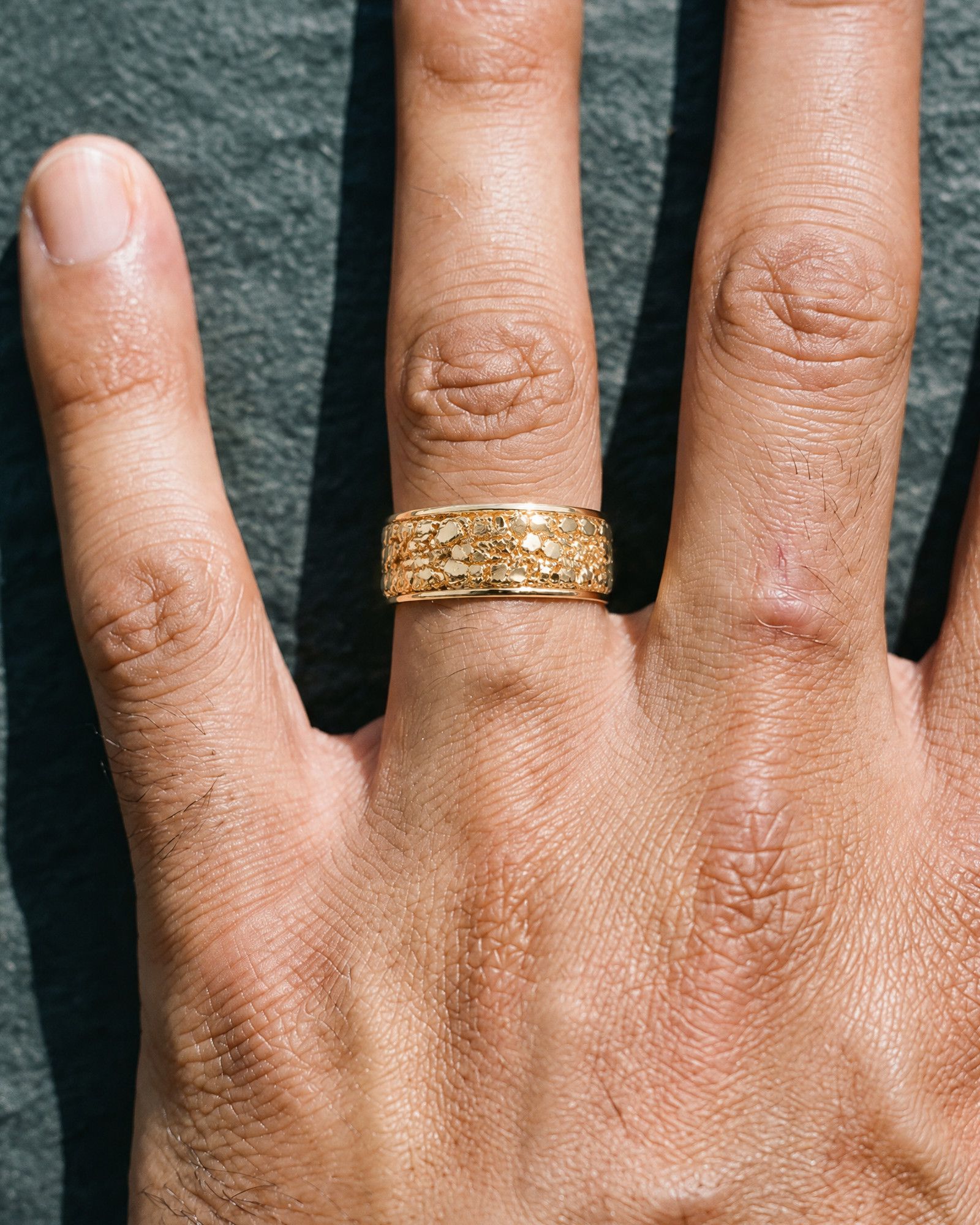 No. 508 Placer nugget ring, worn, close-up on the hand, 14K yellow gold