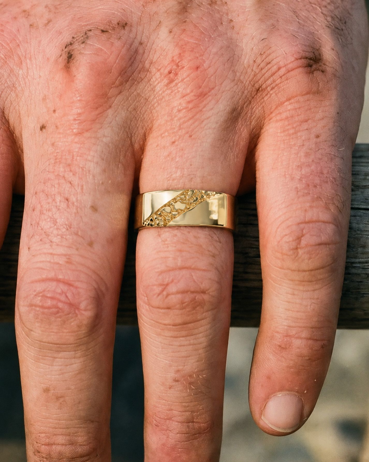 No. 518 Fault Line nugget ring, worn, close-up on the hand, 14K yellow gold
