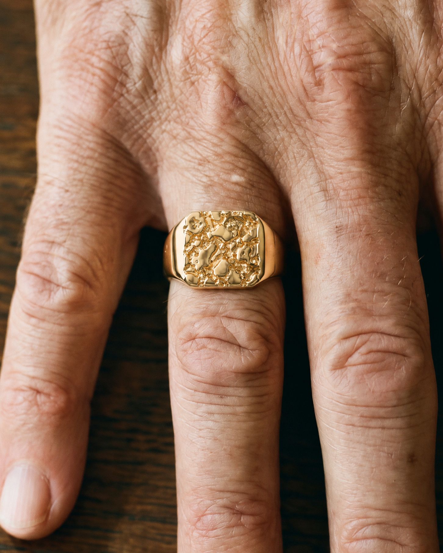 No. 502 Bullion nugget ring, worn, close-up on the hand, 14K yellow gold