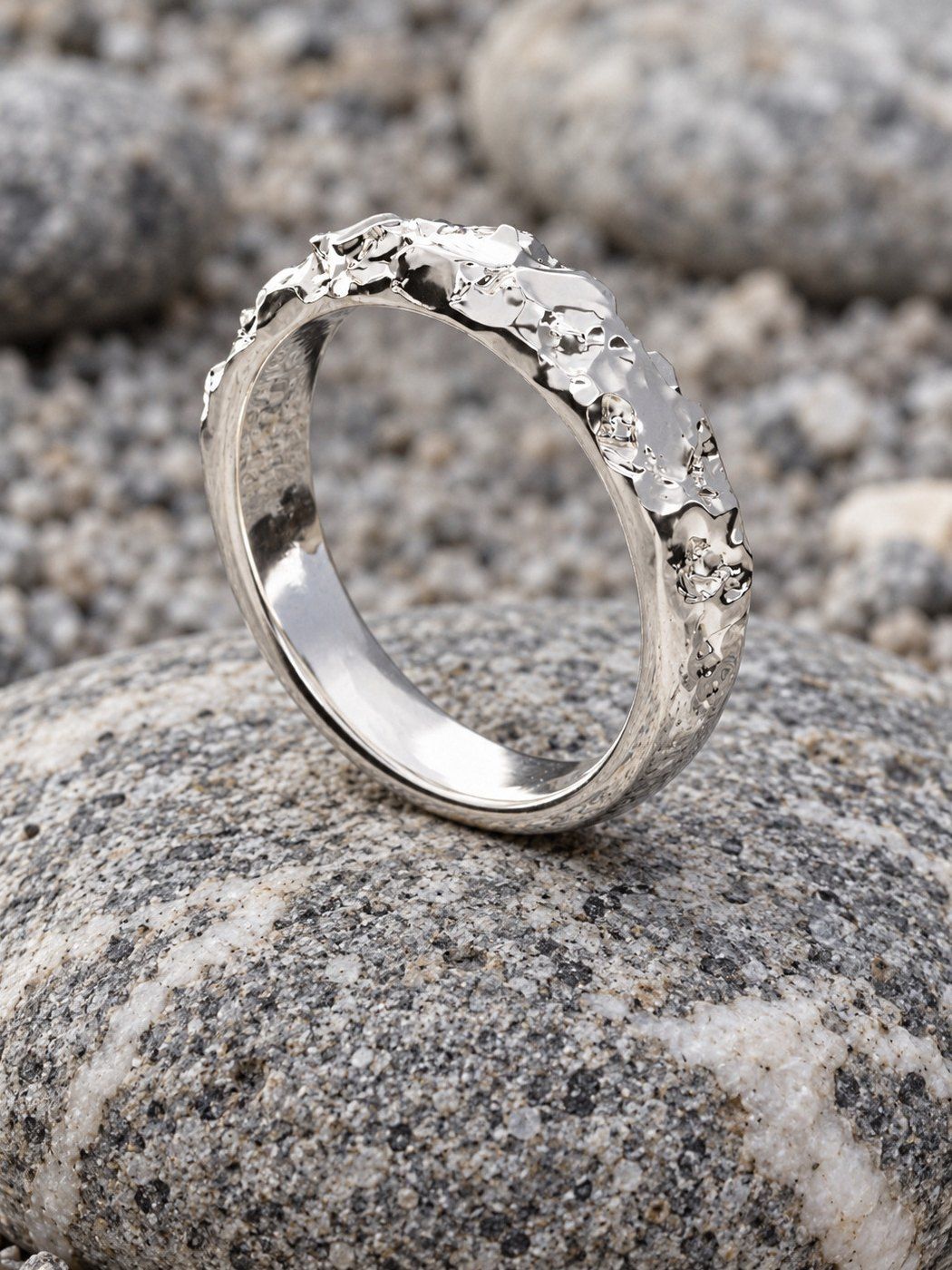 Slim No. 024 in sterling silver, still life on rock