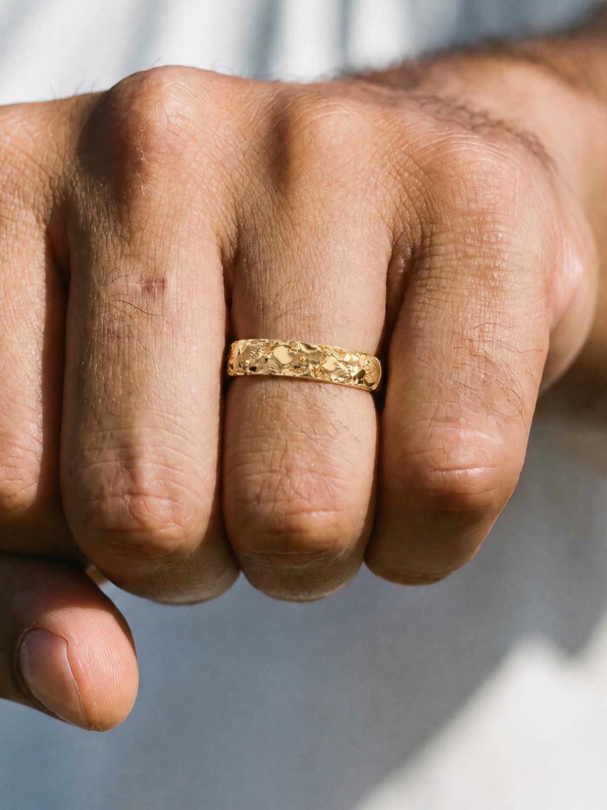 Slim No. 024 in solid 14K gold, worn on the hand