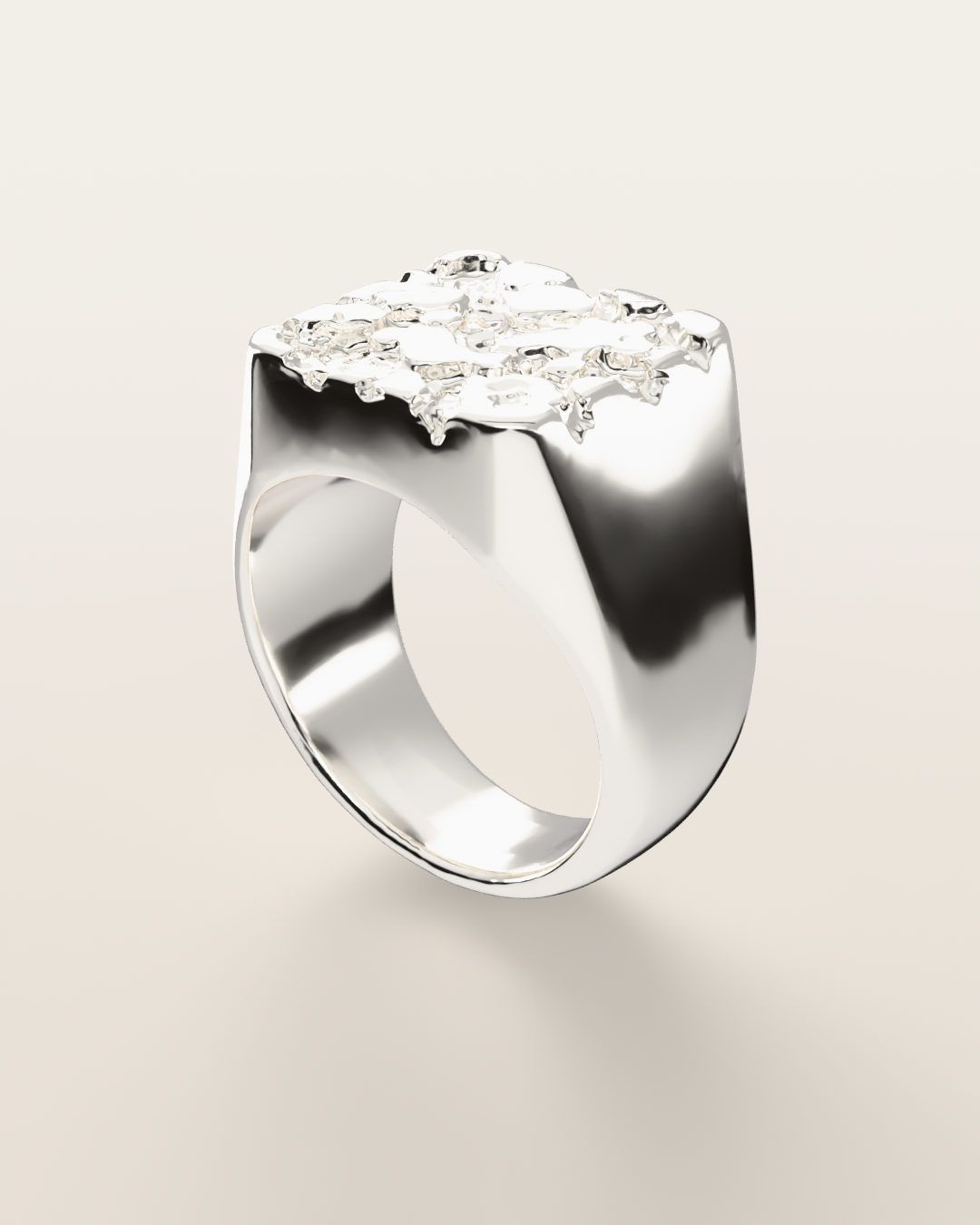 No. 502 Bullion nugget ring, turning slowly under a low light, sterling silver, rendered from the production 3D file