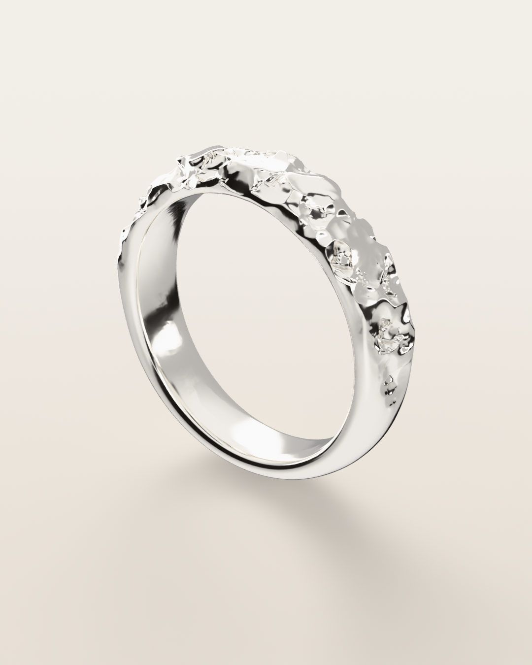 No. 024 Slim nugget ring, turning slowly under a low light, sterling silver, rendered from the production 3D file