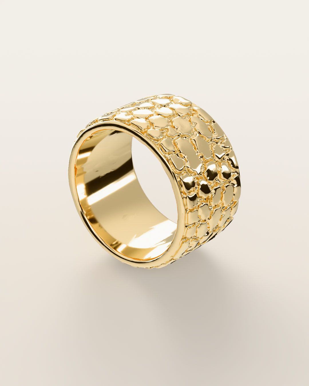 No. 447 Cigar Band nugget ring, turning slowly under a low light, 14K yellow gold, rendered from the production 3D file