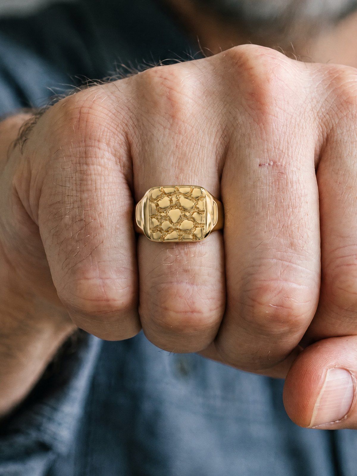 Signet L No. 401 in solid 14K gold, worn, close-up on the hand