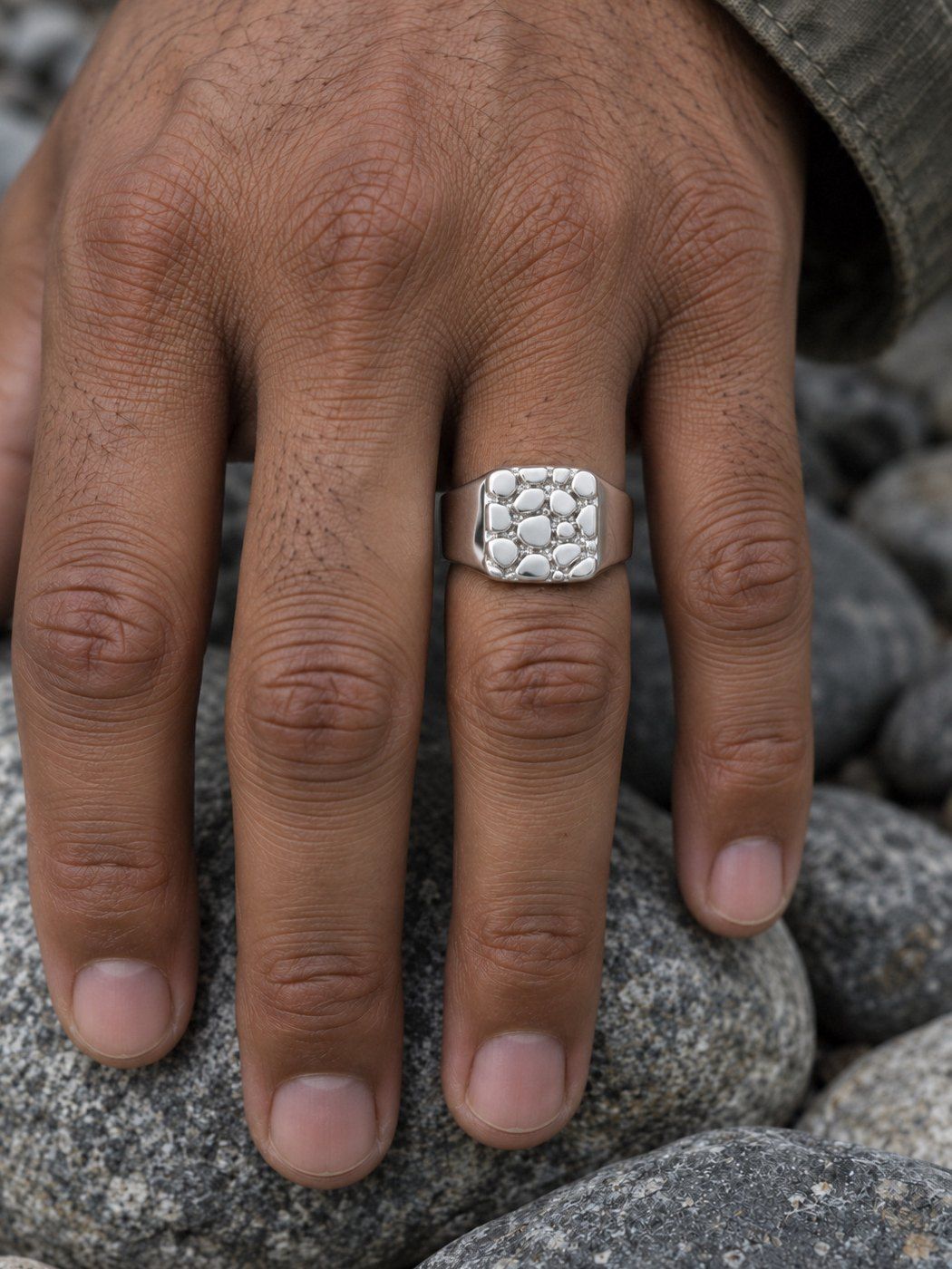 Signet L No. 401 in sterling silver, worn, close-up on the hand