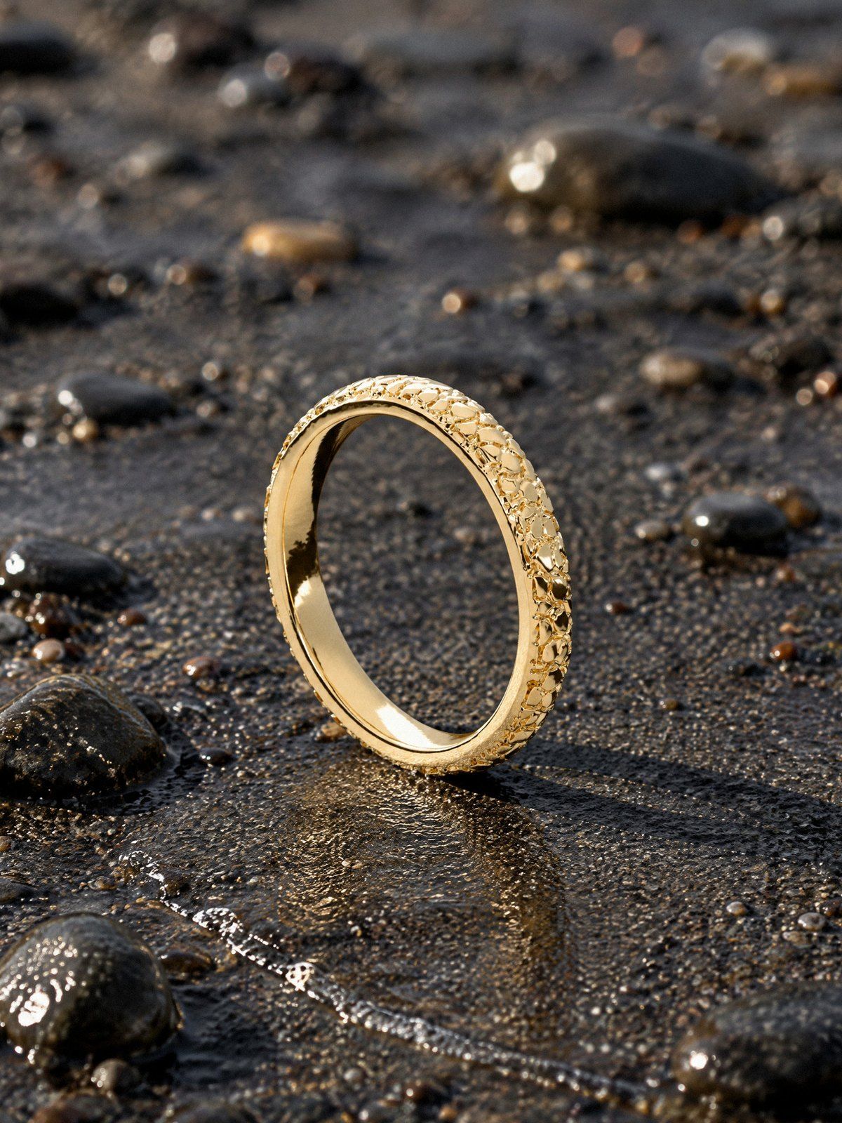 Stacking Band 3 mm No. 444 in solid 14K gold, still life on river stones