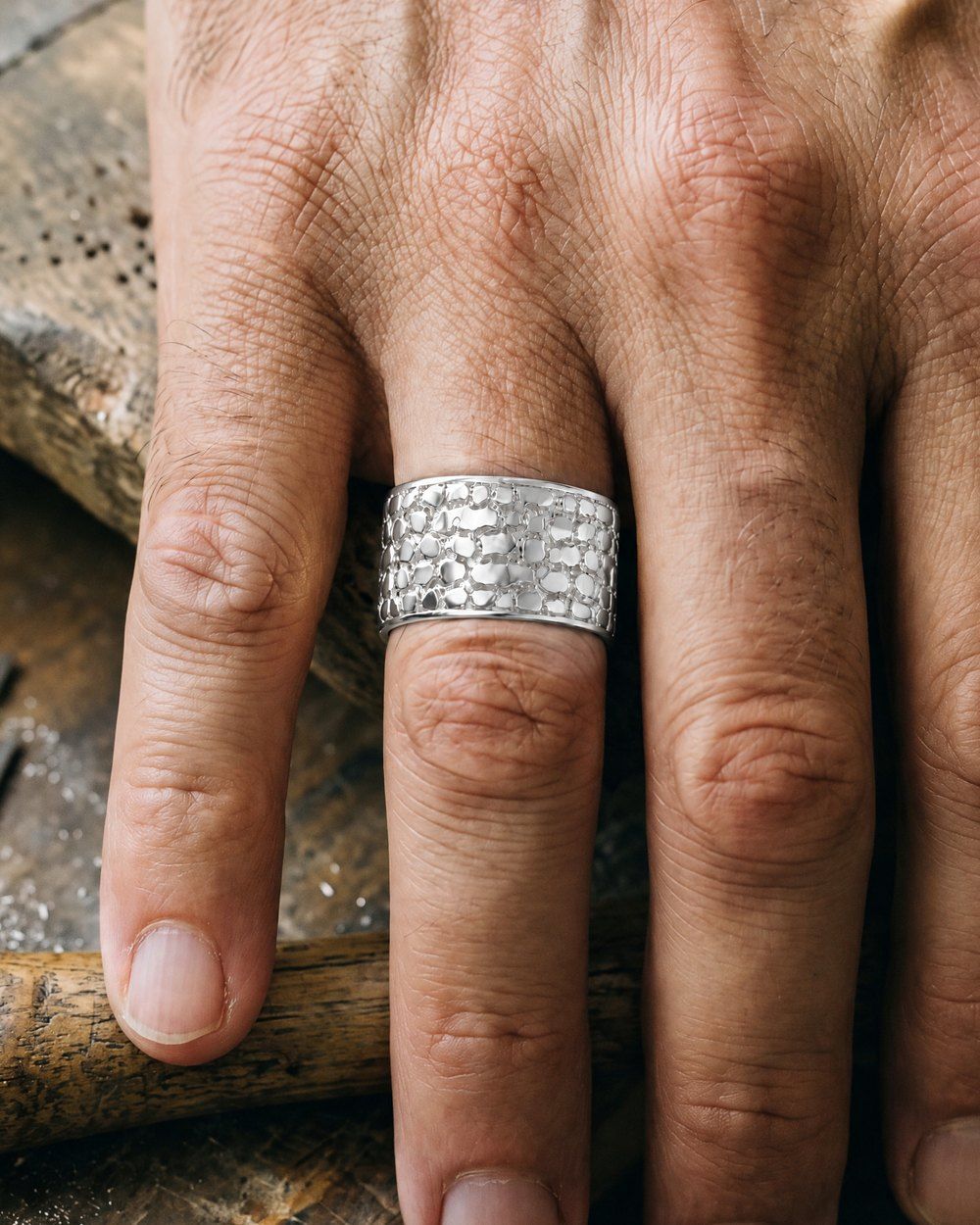 No. 447 Cigar Band nugget ring, worn, close-up on the hand, sterling silver