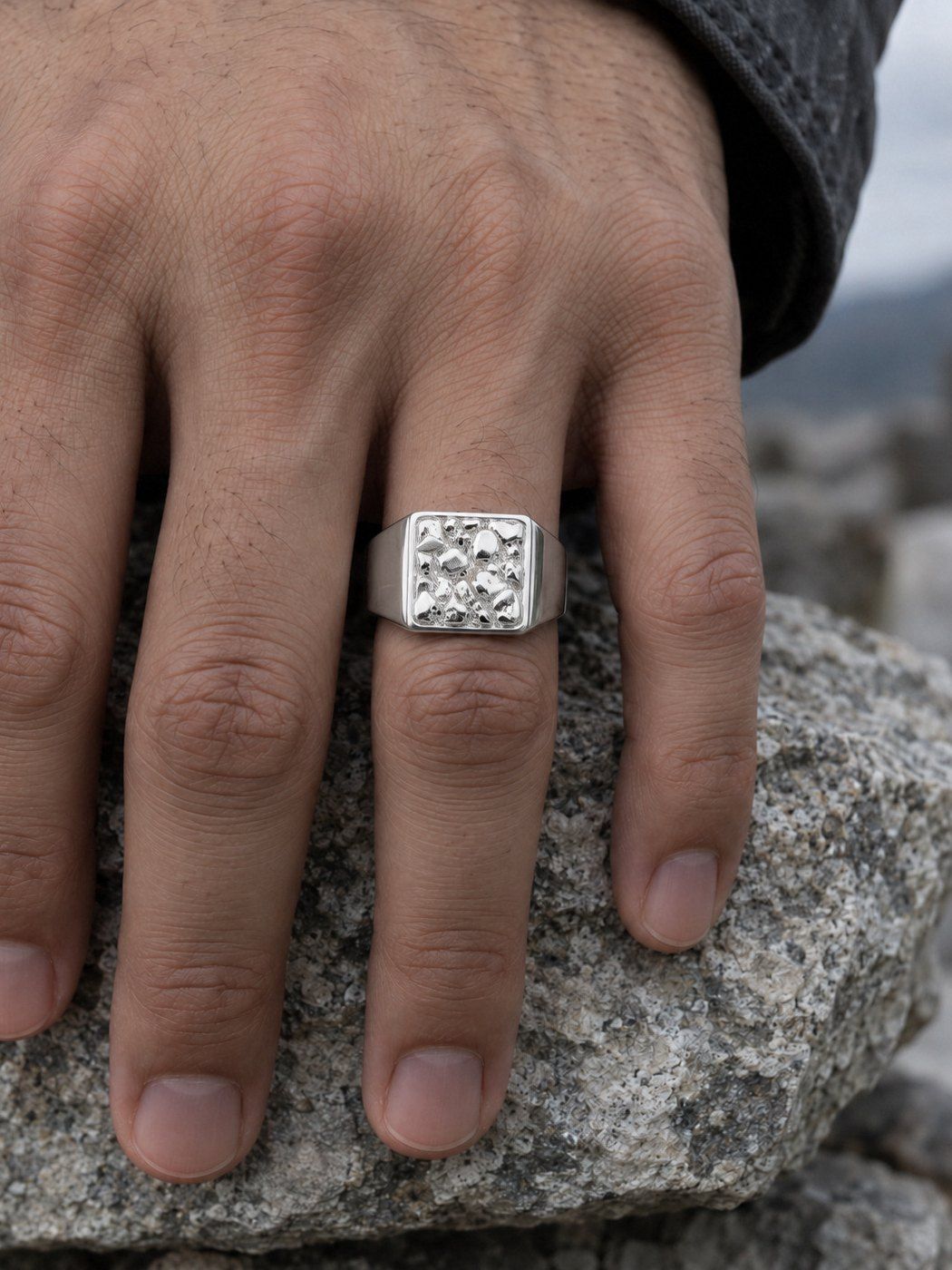 Anvil No. 501 in sterling silver, worn, close-up on the hand
