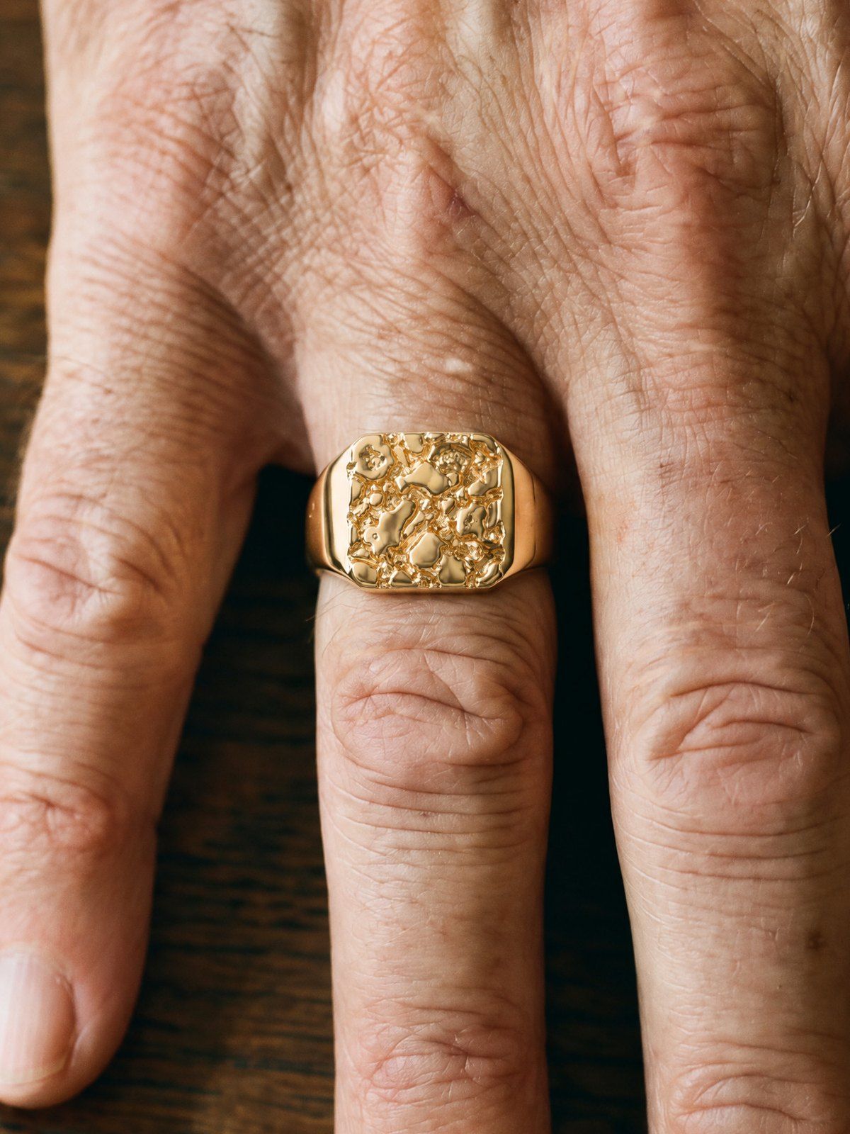 Bullion No. 502 in solid 14K gold, worn, close-up on the hand