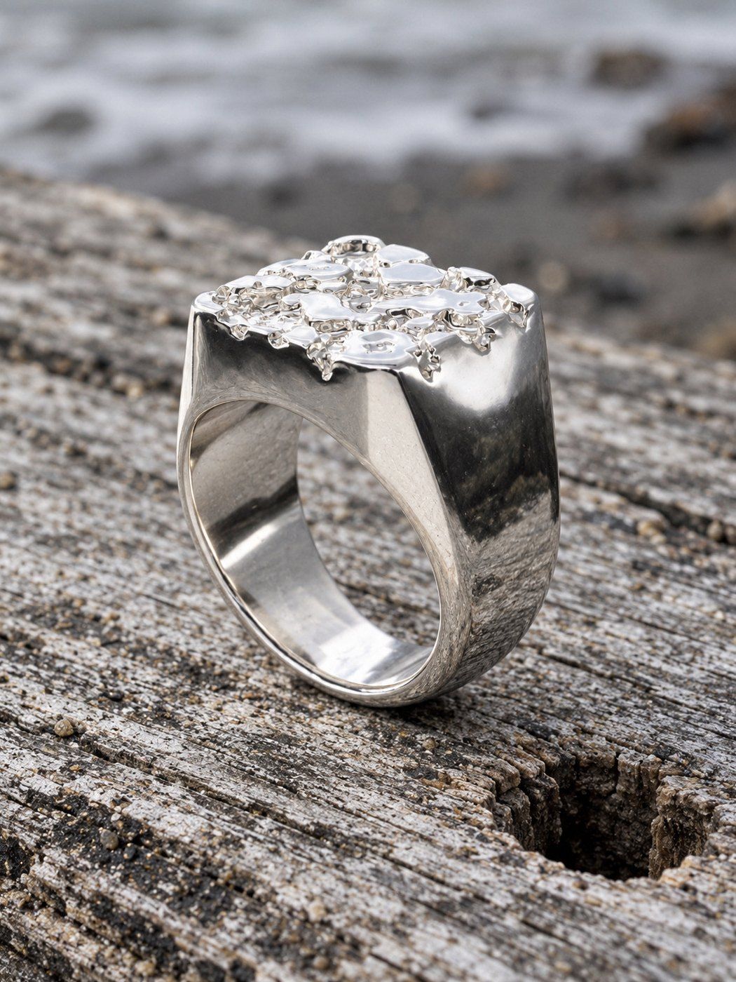 Bullion No. 502 in sterling silver, still life on dark stone