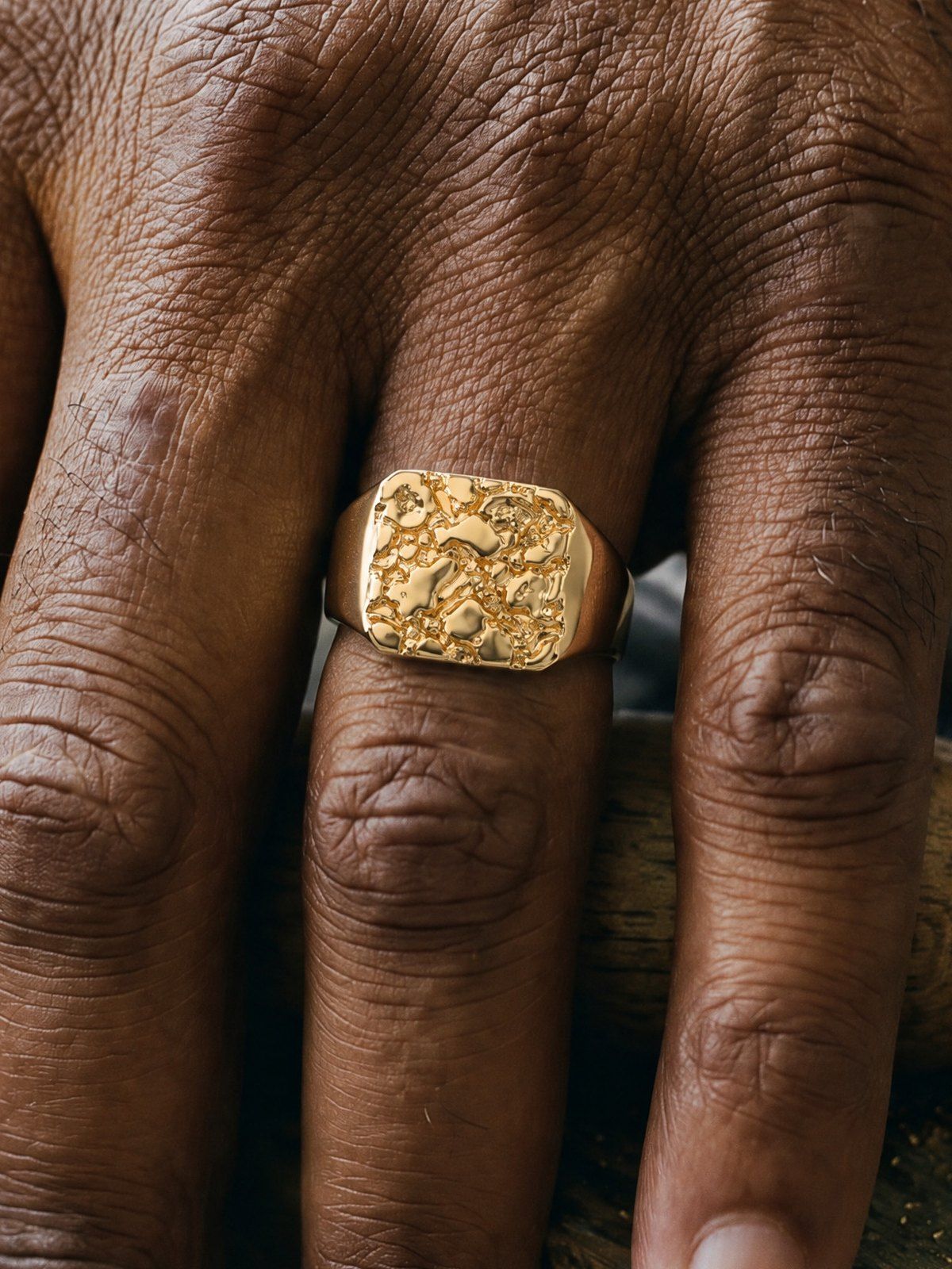 Bullion No. 502 in solid 14K gold, worn on another hand