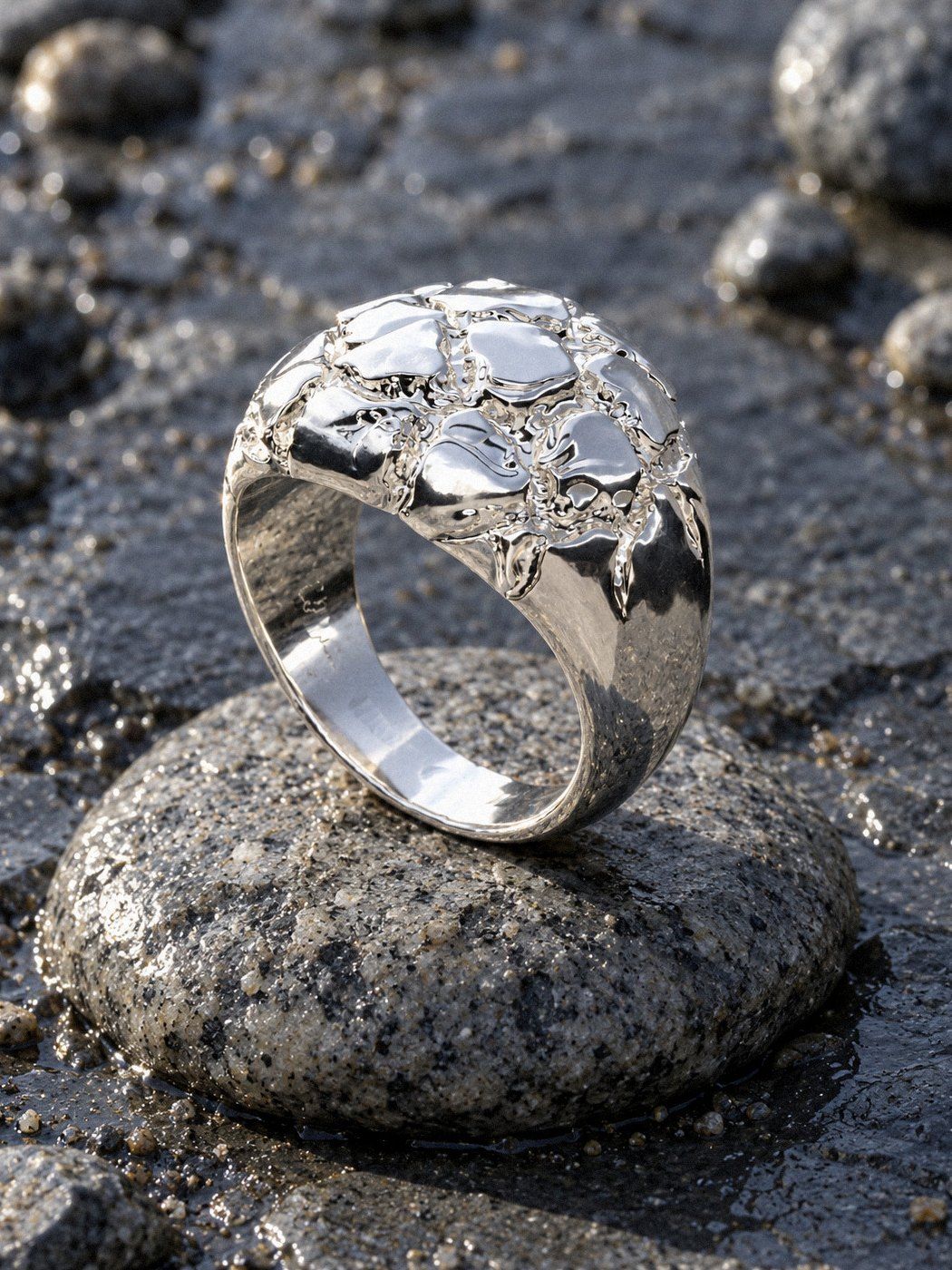 Boulder No. 503 in sterling silver, still life on river stones
