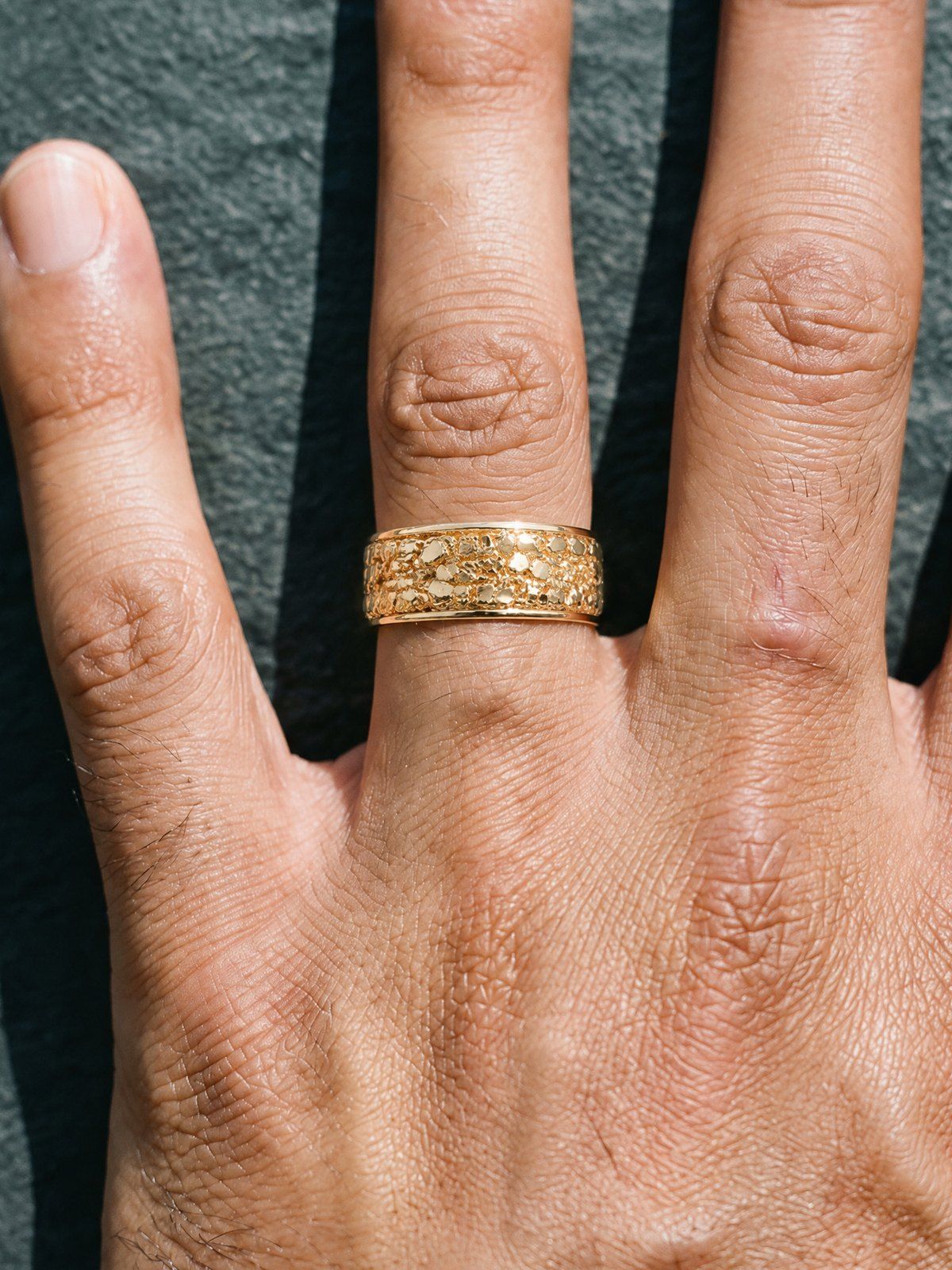 Placer No. 508 in solid 14K gold, worn, close-up on the hand