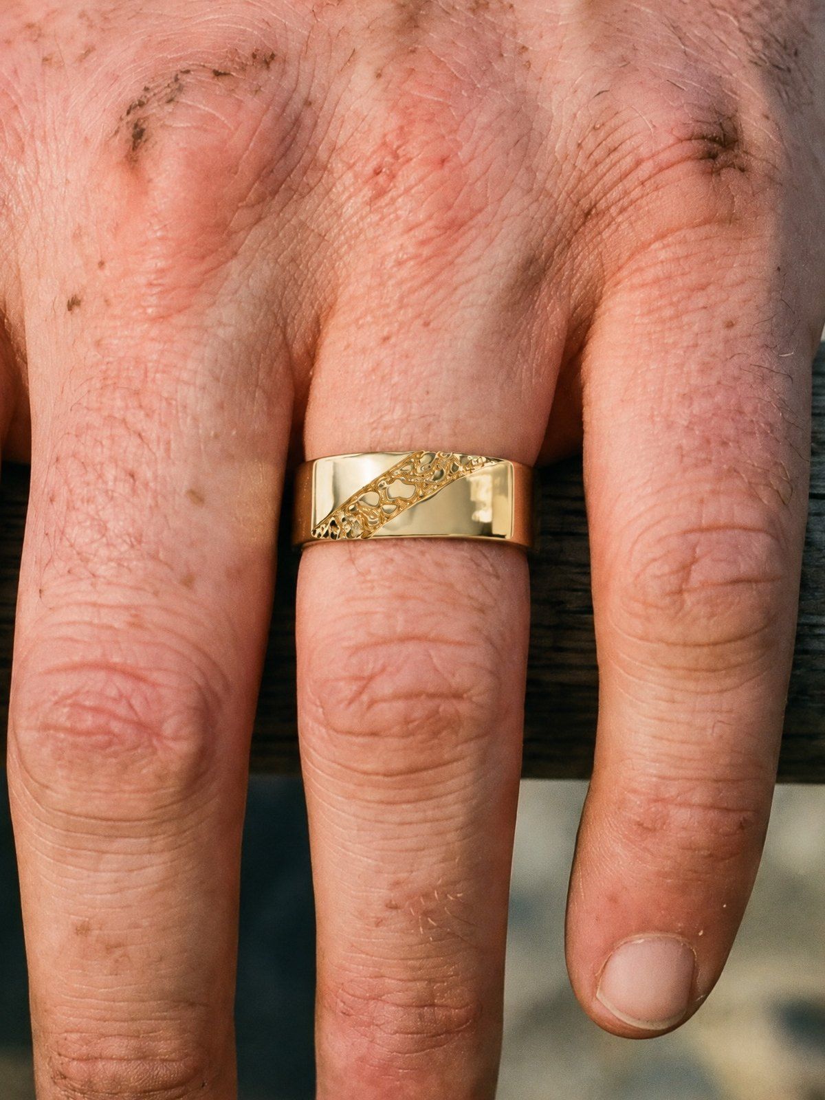 Fault Line No. 518 in solid 14K gold, worn, close-up on the hand