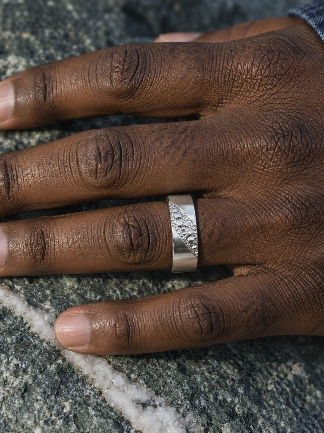 Fault Line No. 518 in sterling silver, worn, close-up on the hand
