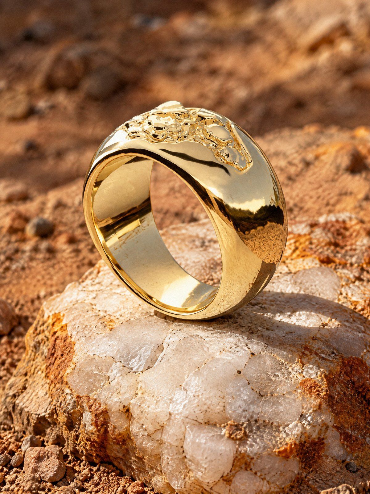 Outcrop No. 521 in solid 14K gold, still life on rock