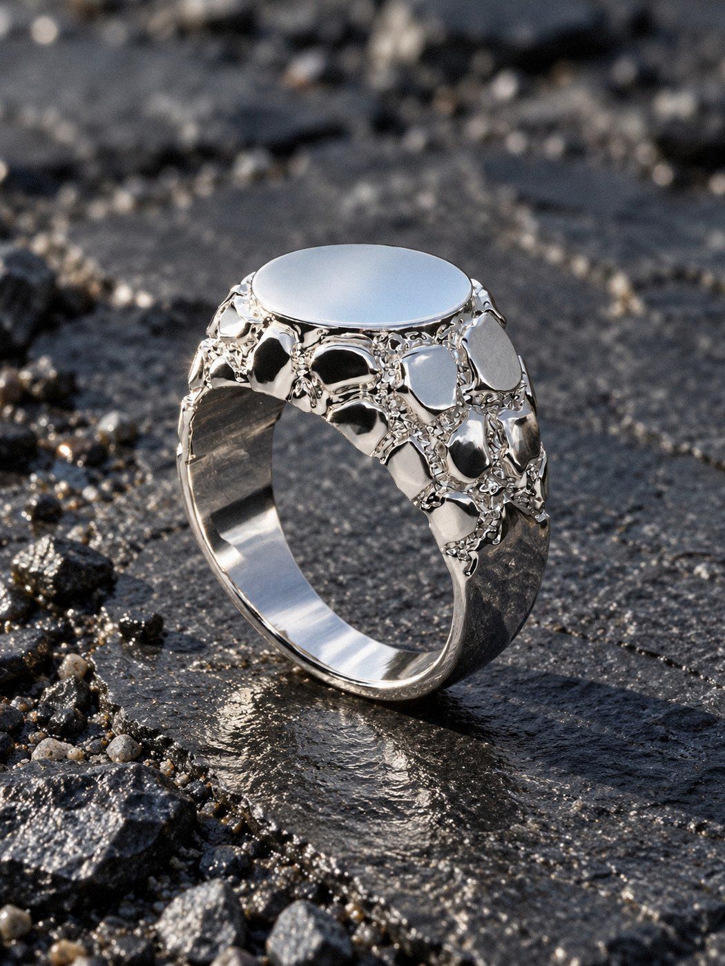 Facet No. 523 in sterling silver, still life on dark stone
