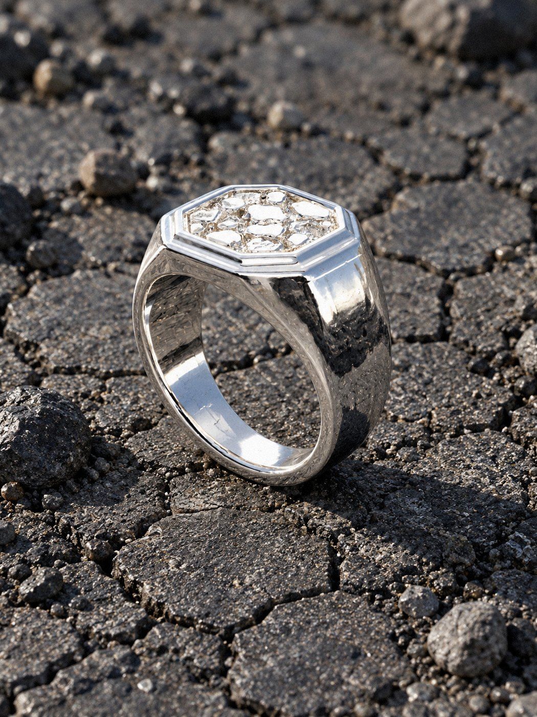 Octagon No. 531 in sterling silver, still life on dark stone