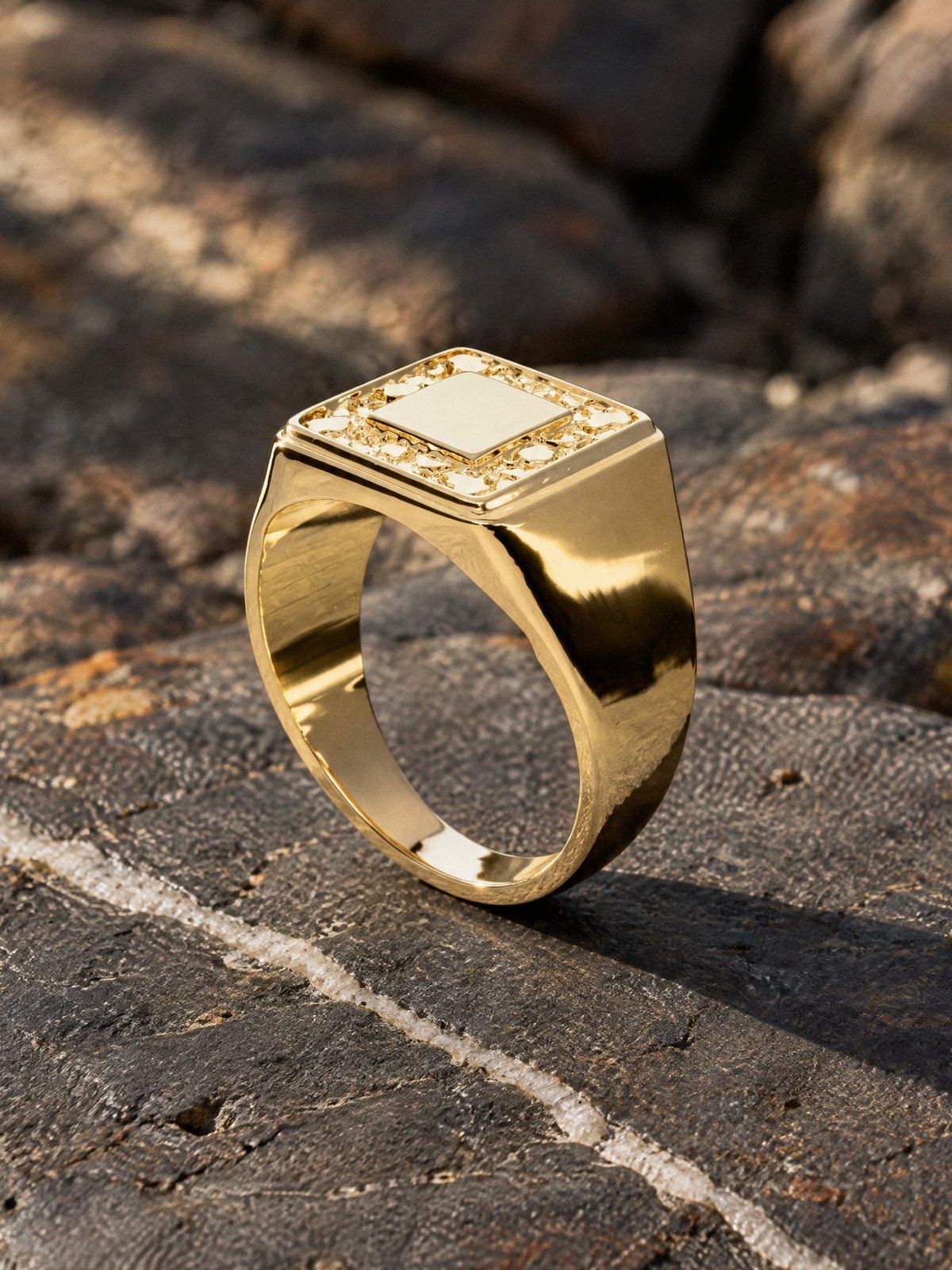 Inverse No. 535 in solid 14K gold, still life on dark stone