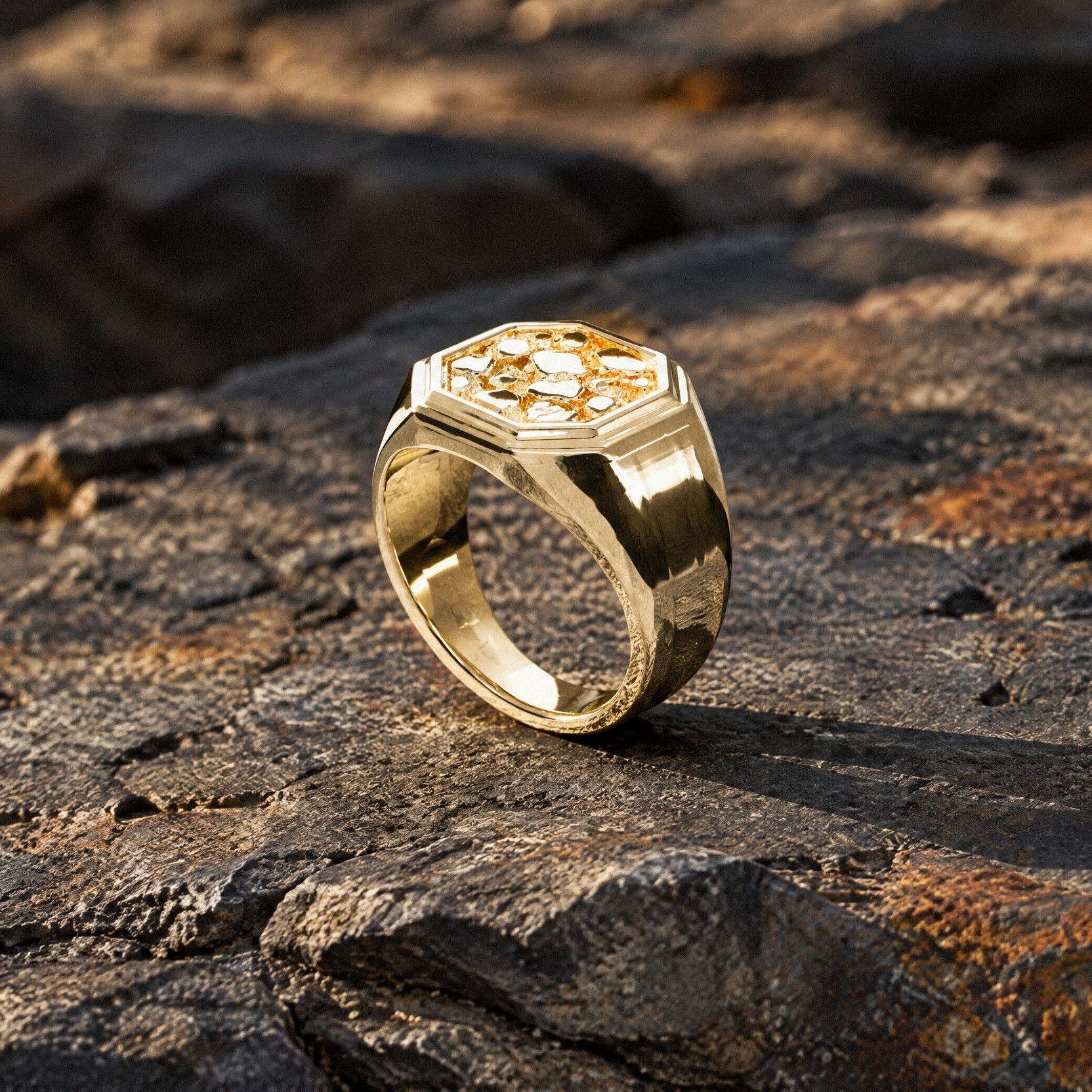No. 531 Octagon nugget ring in 14K yellow gold, on a ledge of dark slate